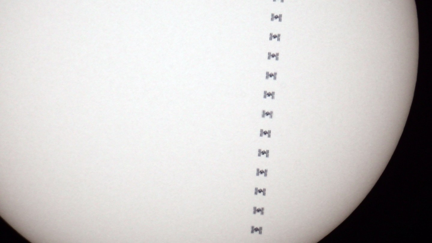 ISS passes the sun