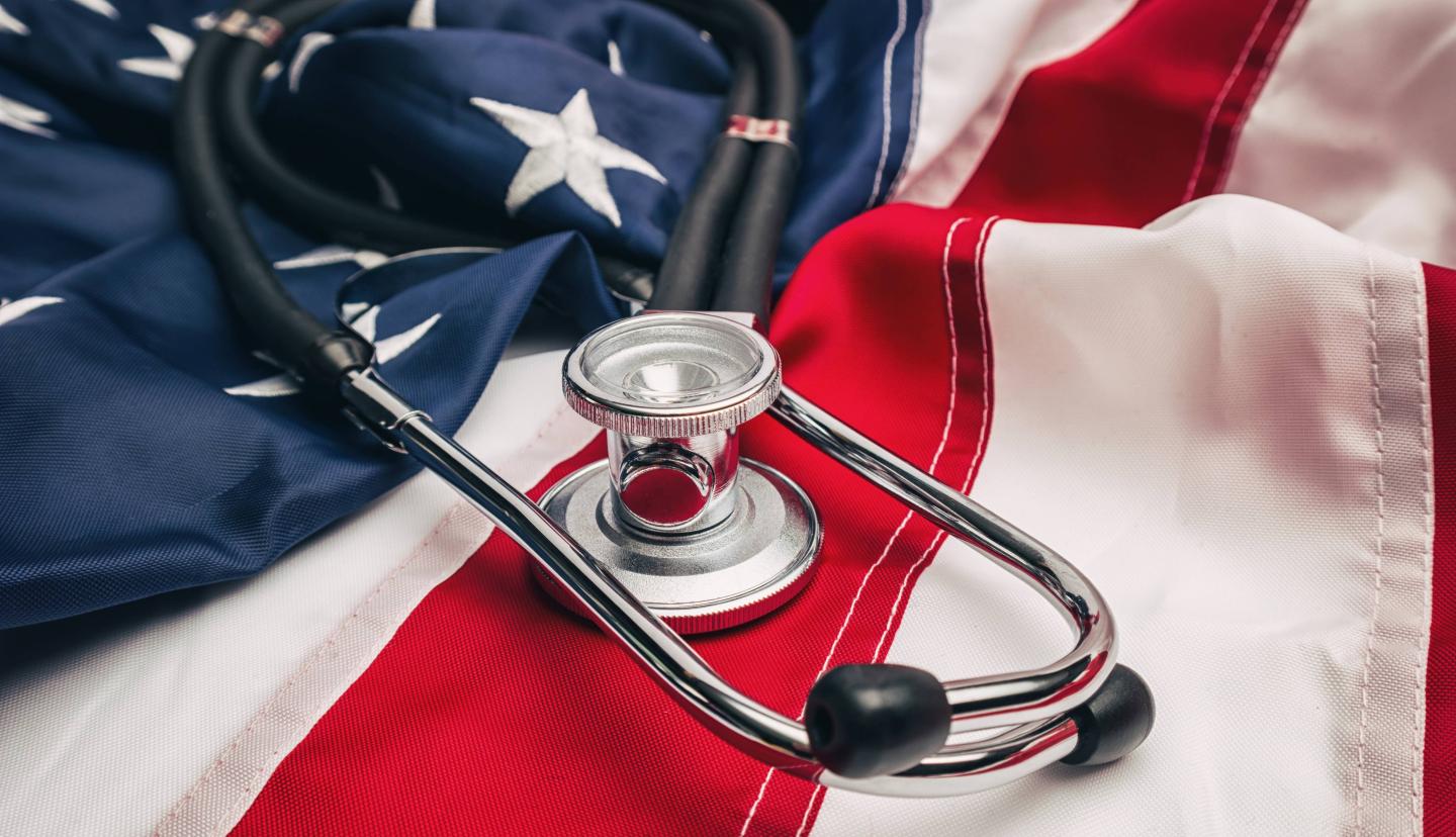 Close-Up Of Stethoscope On American Flag