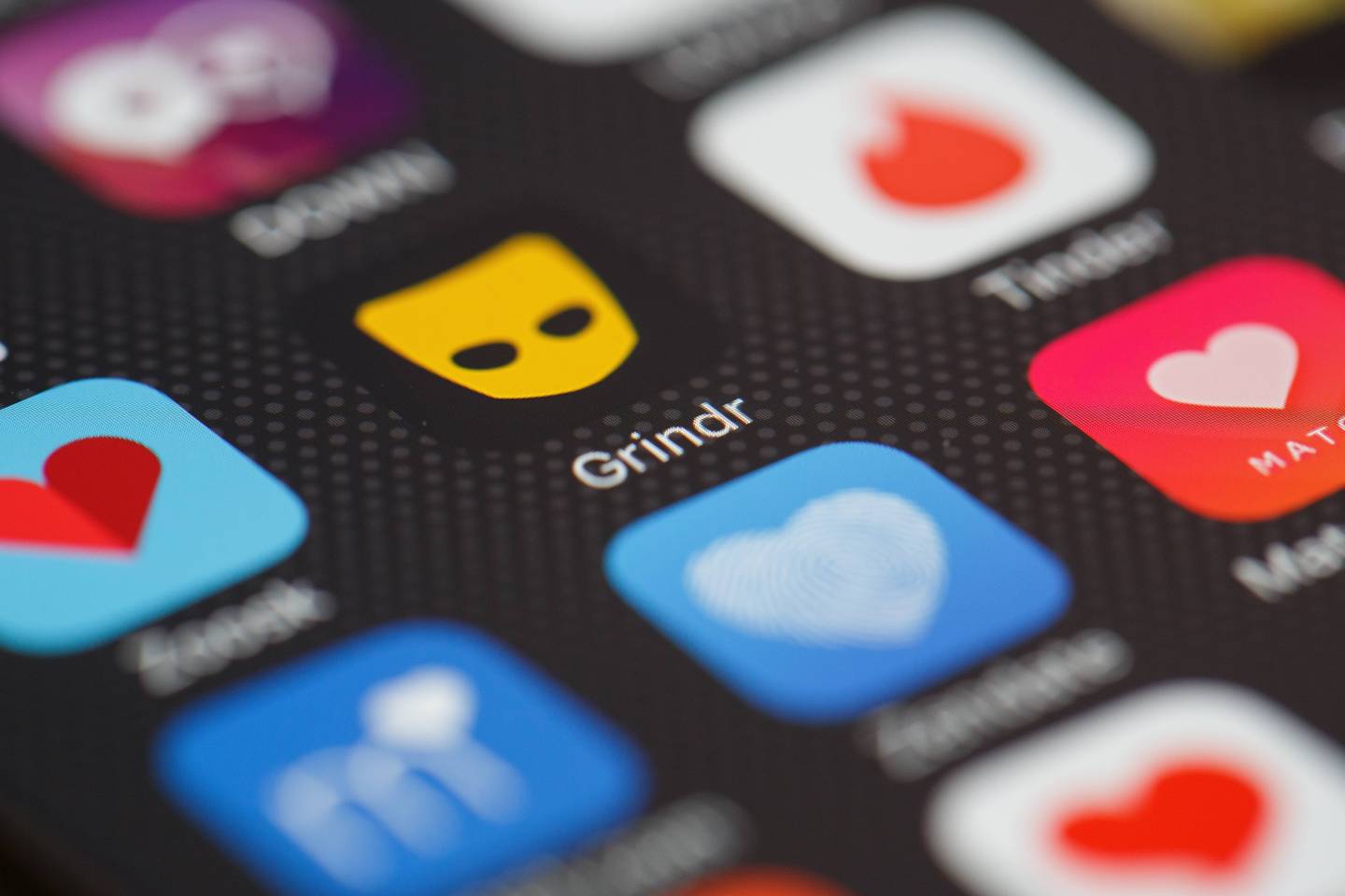 The "Grindr" app logo is seen amongst other dating apps on a mobile phone screen on November 24, 2016 in London, England.
