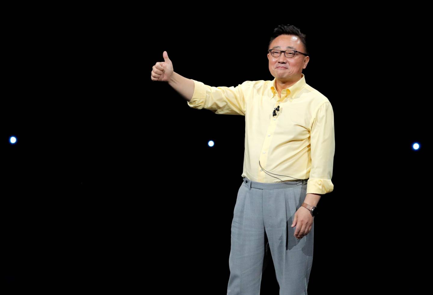 DJ Koh, Samsung's Mobile Communications Division President and CEO gestures from the stage during a Samsung product launch event in Brooklyn