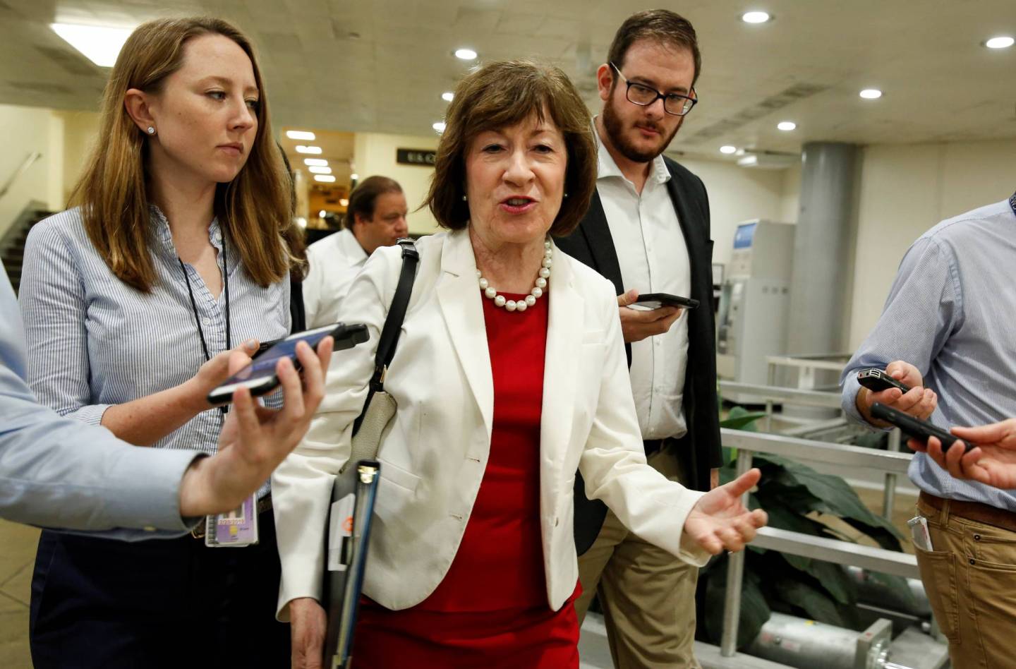 Senator Susan Collins (R-ME) speaks with reporters as she walks at the U.S. Capitol in Washington