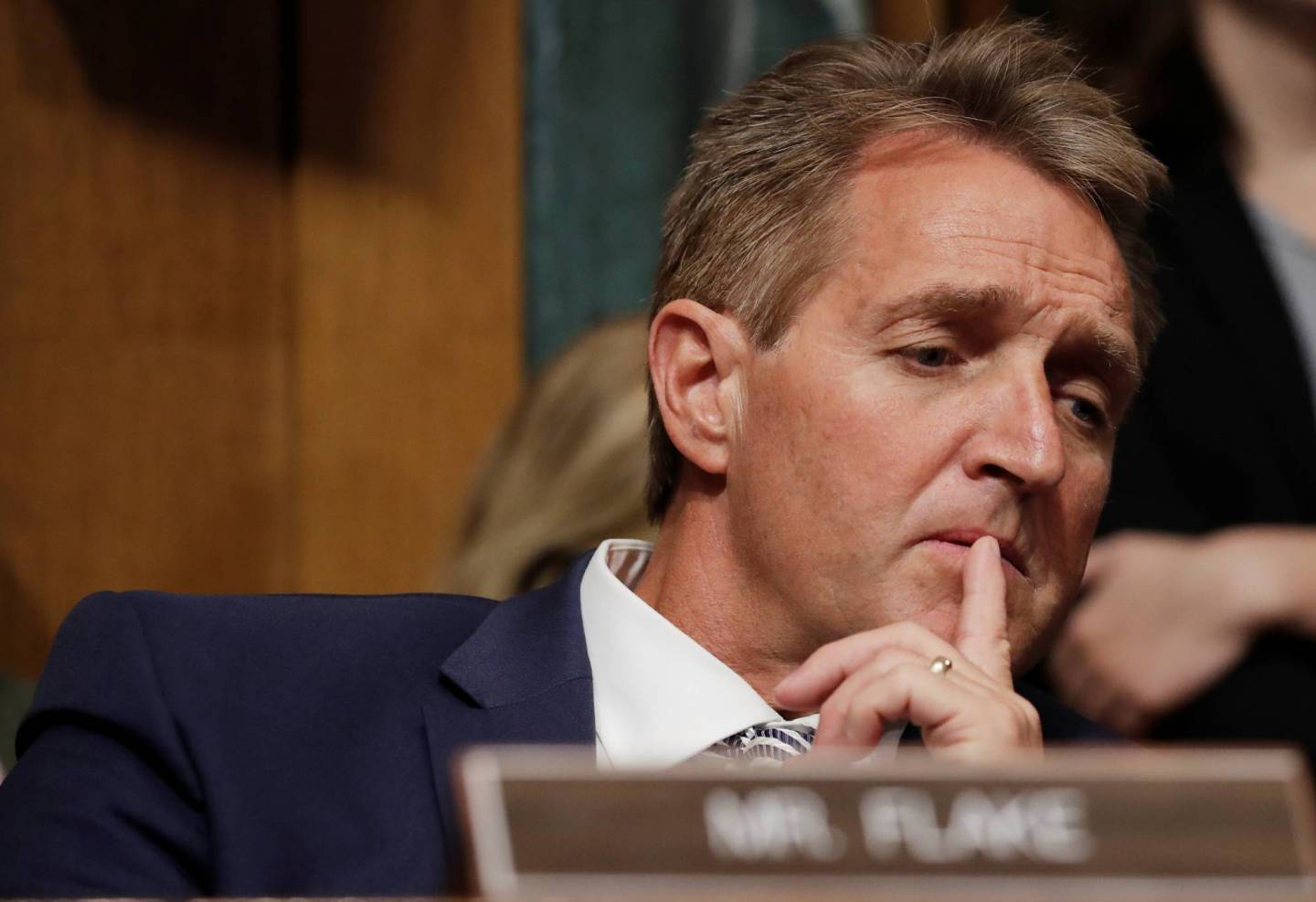 U.S. Senator Flake listens as members of U.S. Senate Judiciary Committee meet to vote on Kavanaugh Supreme Court nomination on Capitol Hill in Washington