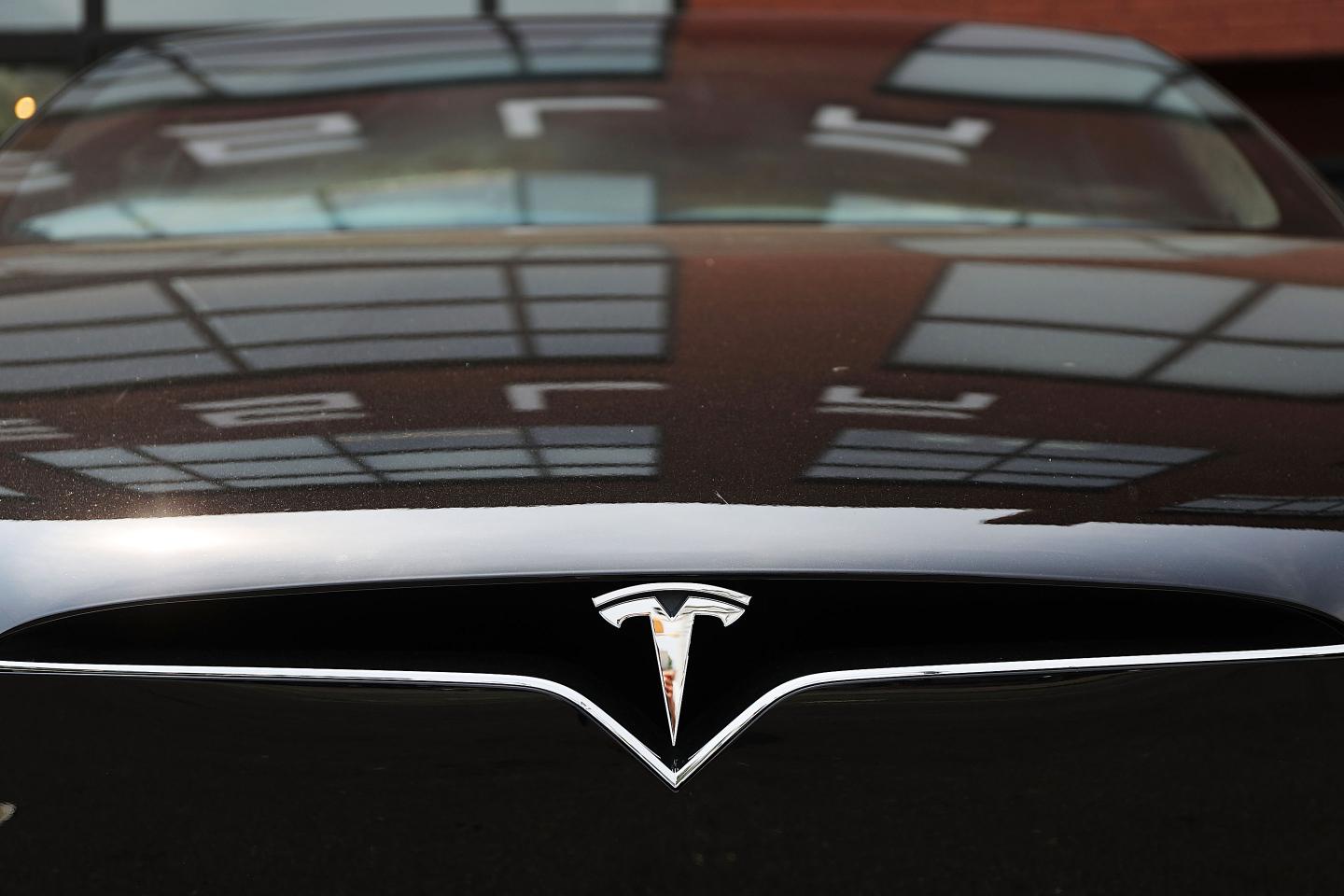 Tesla Shares Slide After Auto Maker Elon Musk Smokes
