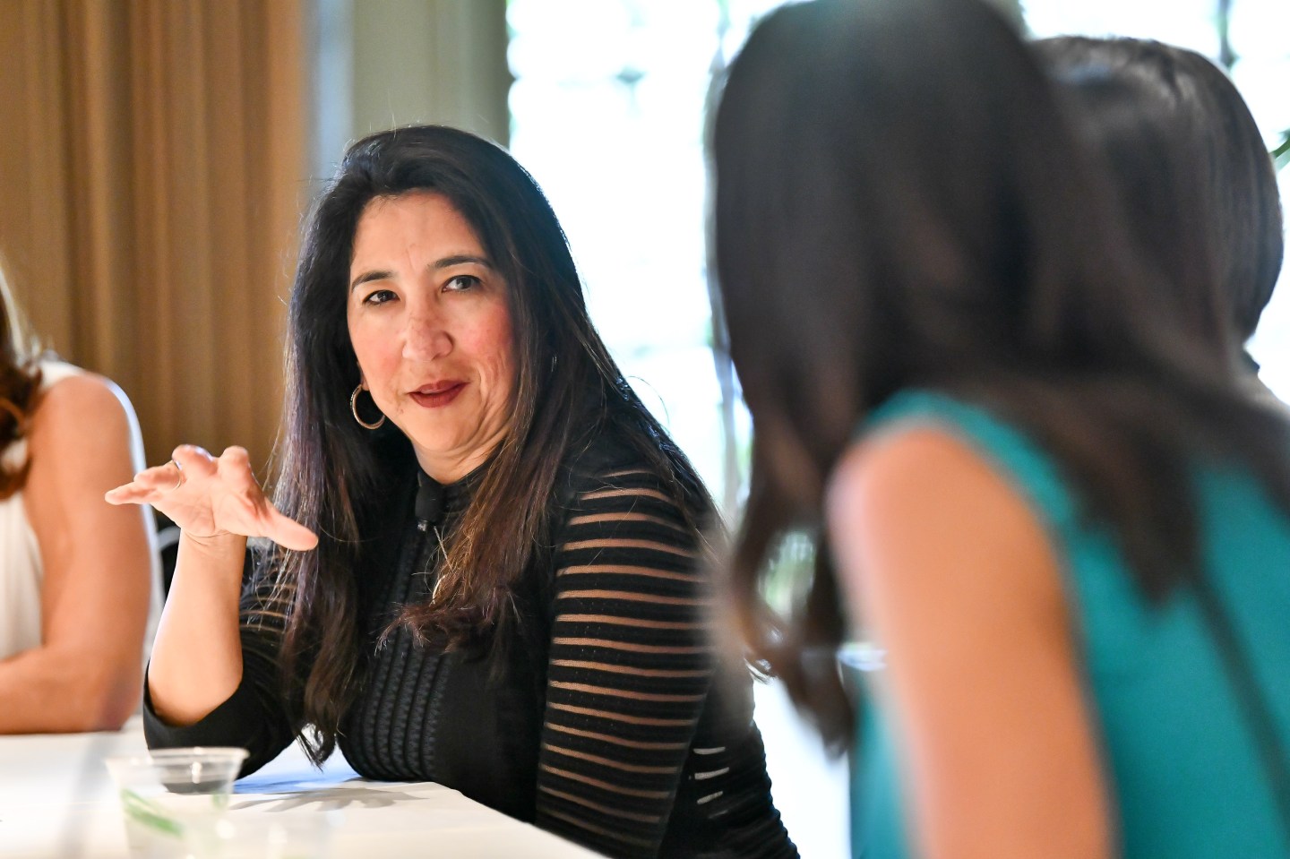 Elena Gomez, CFO of Zendesk, speaks at a Coins2Day Most Powerful Women Summit on Monday. (Photograph by Coins2Day Most Powerful Women)