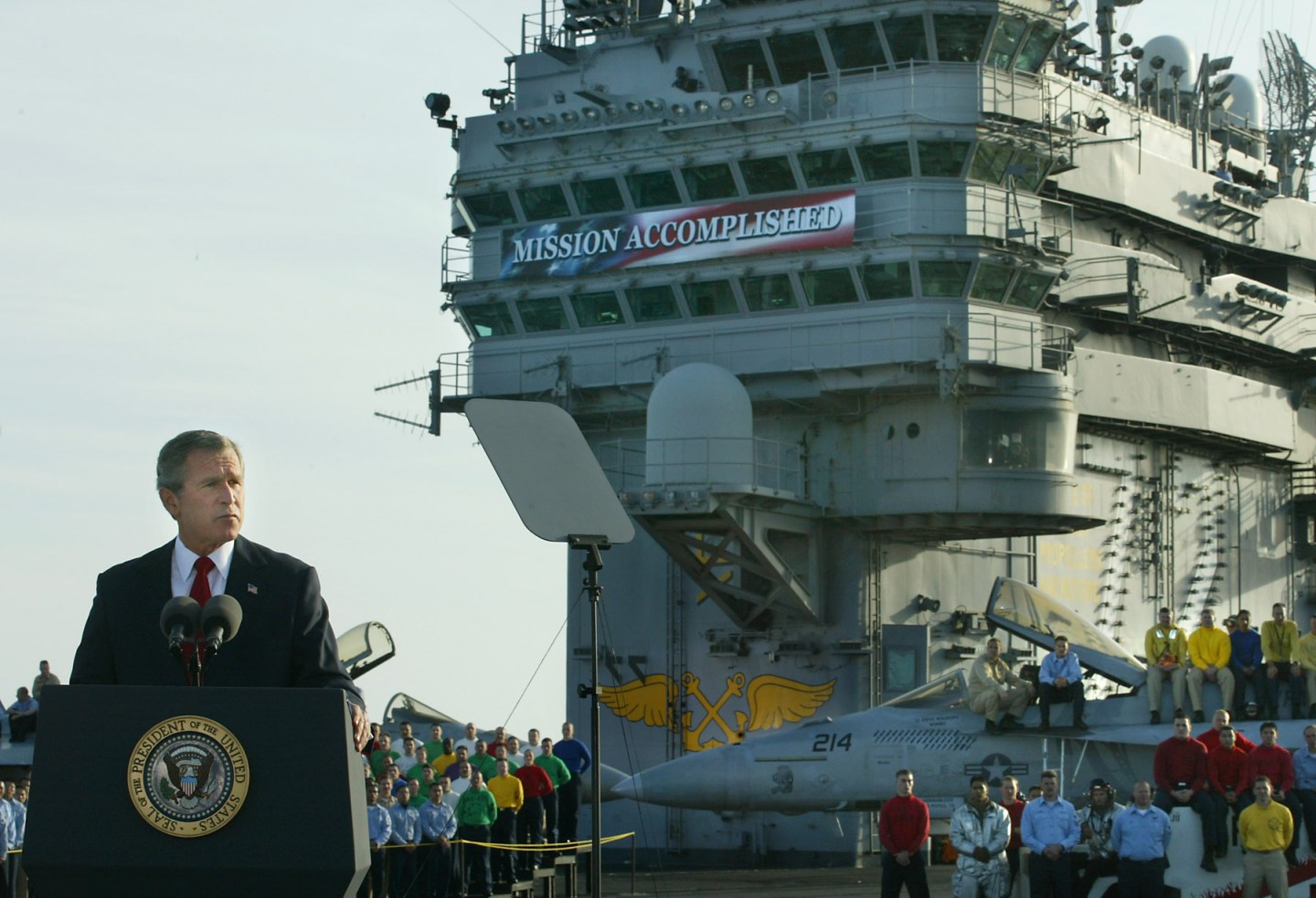 President George W. Bush delivers a speech to on the flight deck of the aircraft carrier USS Abraham Lincoln on May 1, 2003.