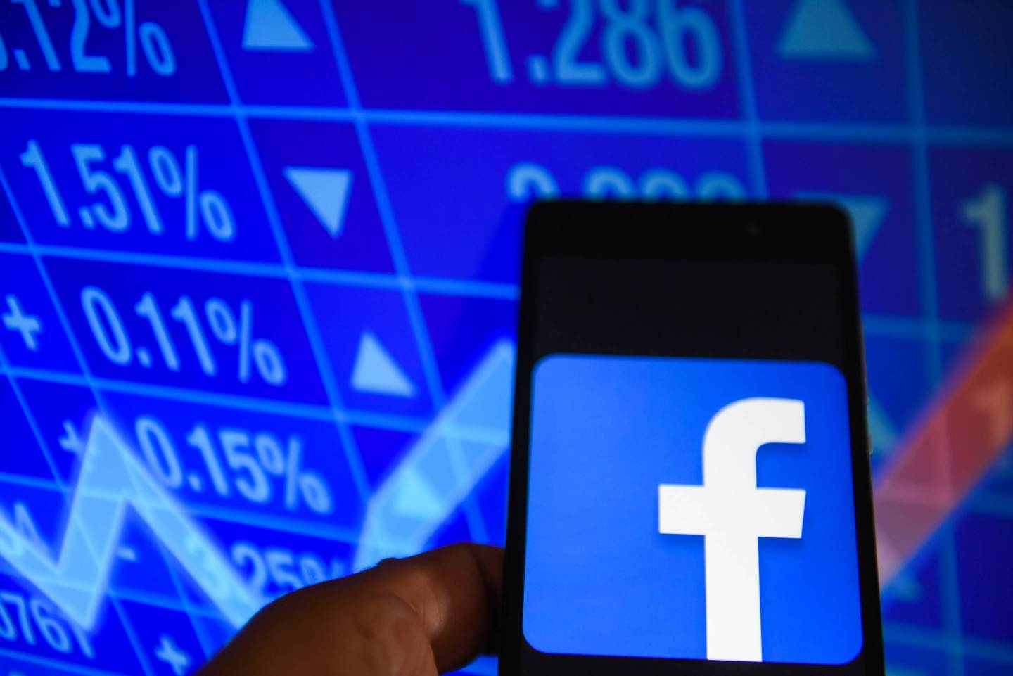 Facebook logo is seen in an Android mobile with  stock