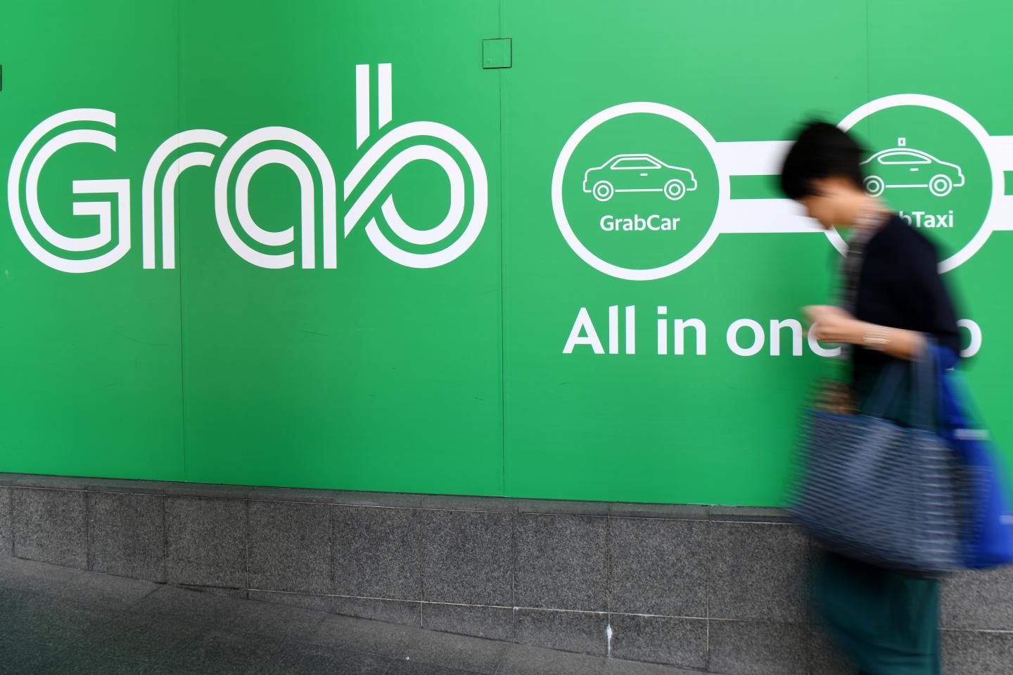 SINGAPORE-INTERNET-TRANSPORT-GRAB-UBER