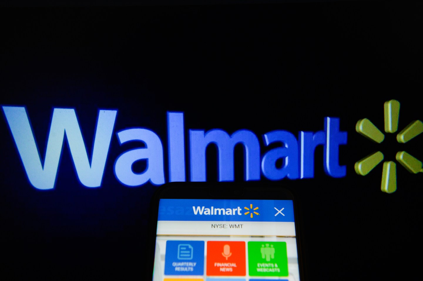 Walmart app is seen on an Androd mobile phone with Walmart