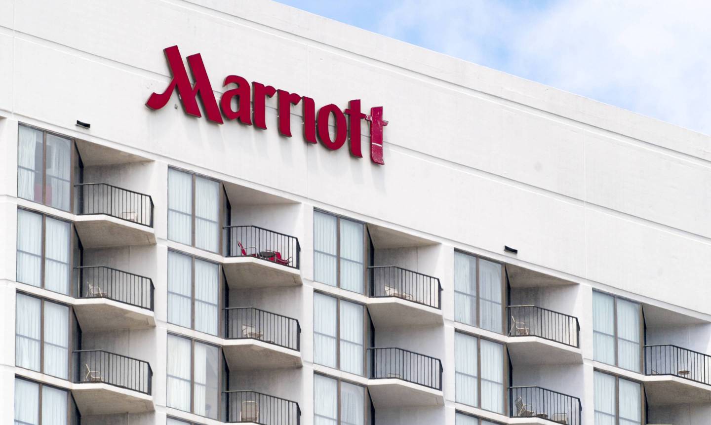 Marriott Hotel Sign or Logo. Upper floors with railings in