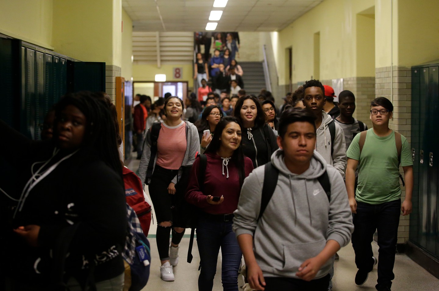 Students walk through the hallway