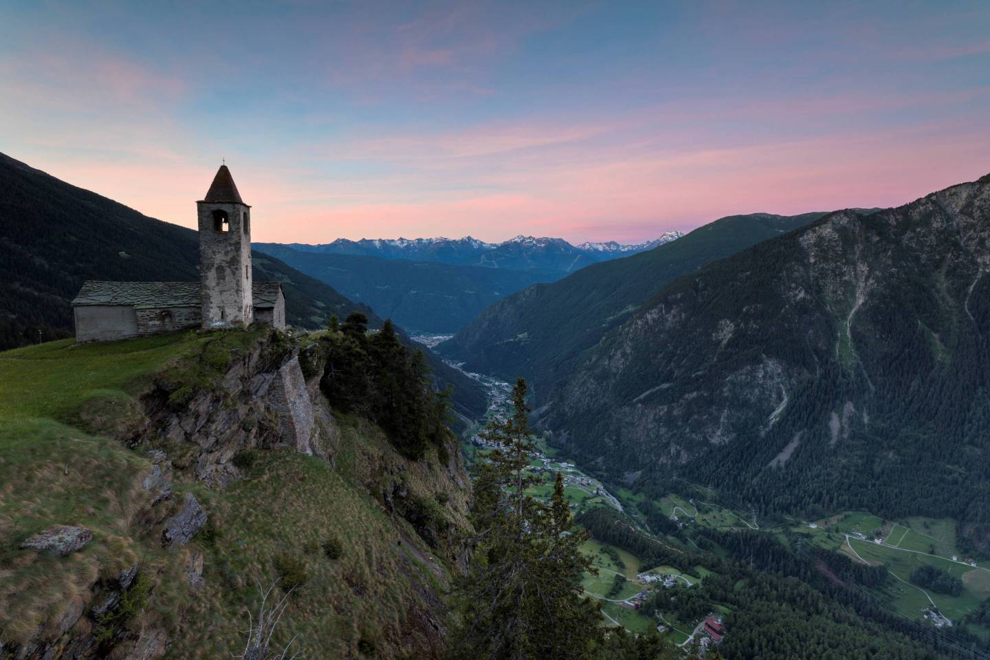 Ancient church at sunrise. San Romerio Alp. Brusio. Canton of GraubŸnden. Poschiavo valley. Switzerland. Europe