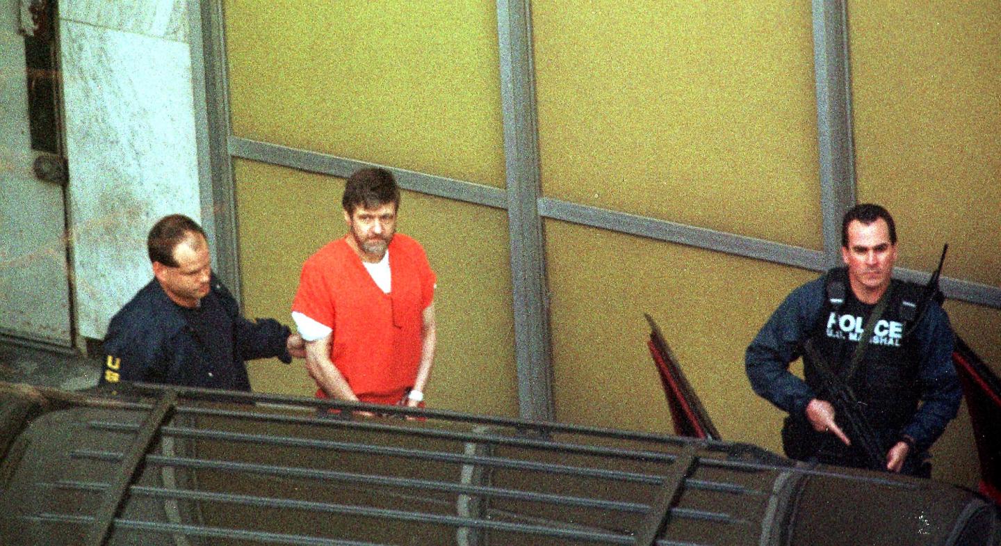 Ted Kaczynski, commonly known as the Unabomber, is led out of court on Jan. 22, 1998.