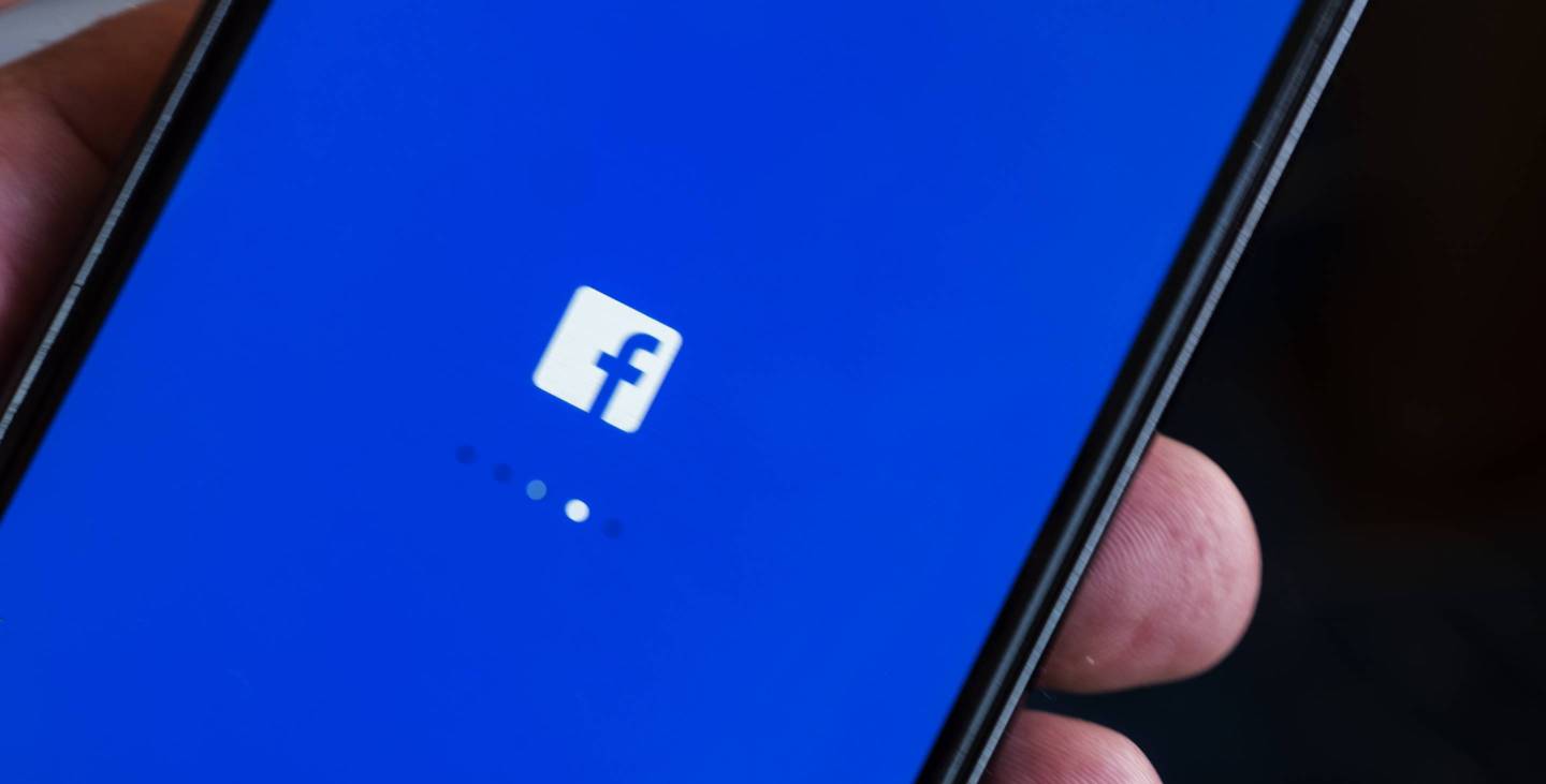 Facebook logo seen displayed on smart phone