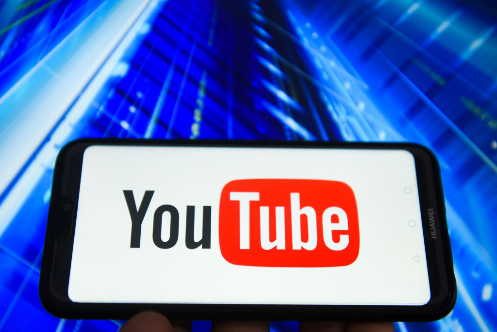 Youtube logo is seen on an Android mobile device