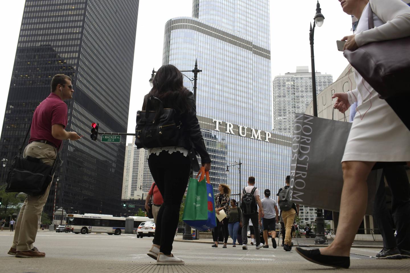 CHICAGO, IL - JULY 31 : Pedestrians walk near Trump Internation