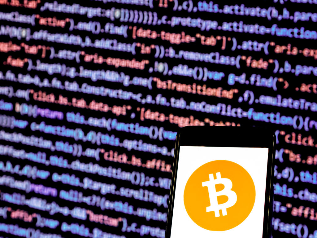 Bitcoin, Cash logo seen displayed on smart phone. Bitcoin is