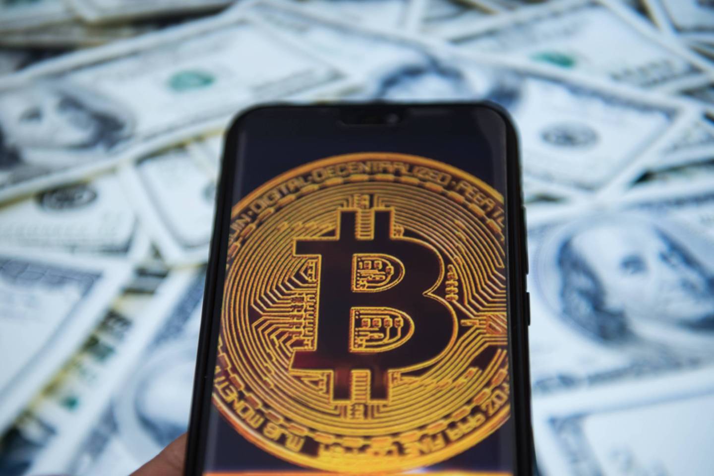 Bitcoin logo is seen on an android mobile phone