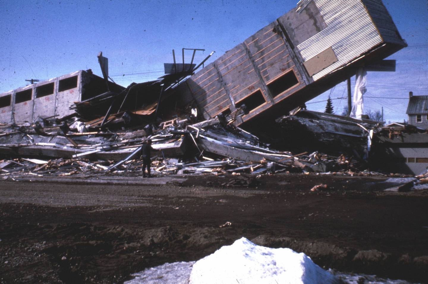 Alaska Earthquake March 27, 1964, The Four Seasons Apartments In Anchorage Was A Six-Story Lift-Slab Reinforced Concrete Building Which Cracked To The Ground During The Earthquake, The Building Was Under Construction, But Structurally Completed, At T