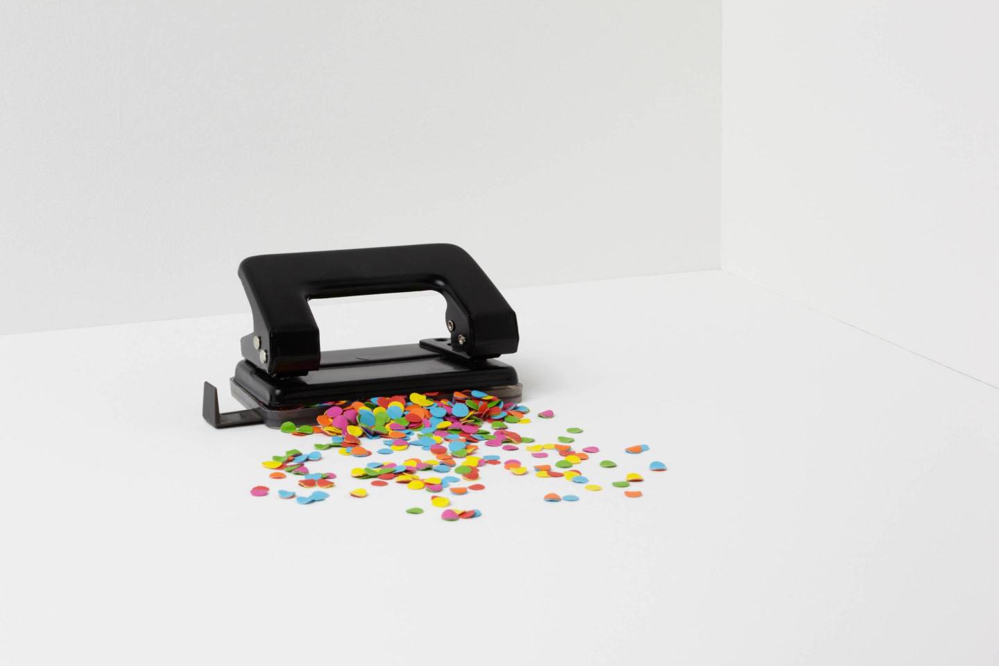 Hole puncher with multi coloured paper