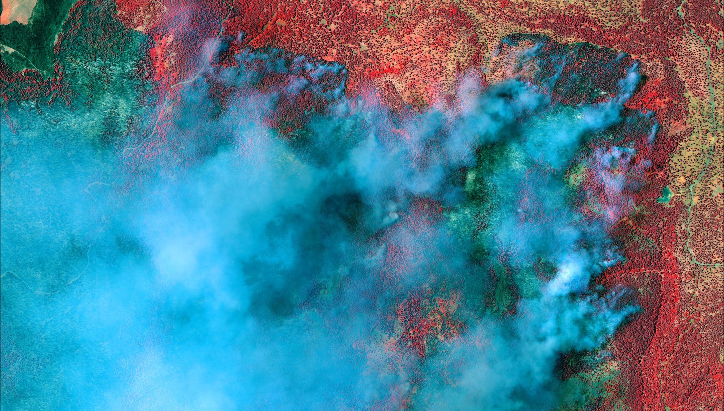 On June 30, 2014, DigitalGlobe's QuickBird Satellite captured an image near the White Mountains in Arizona, showing active burning from the San Juan Fire.