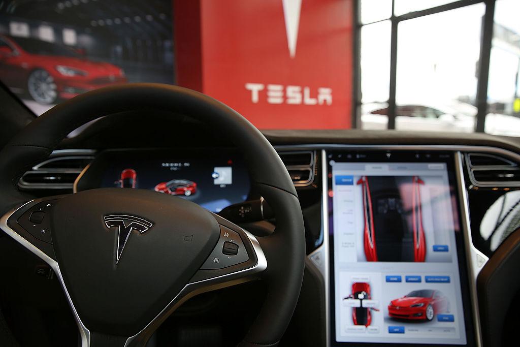Tesla's Summon feature will allow the car to follow its owners around.