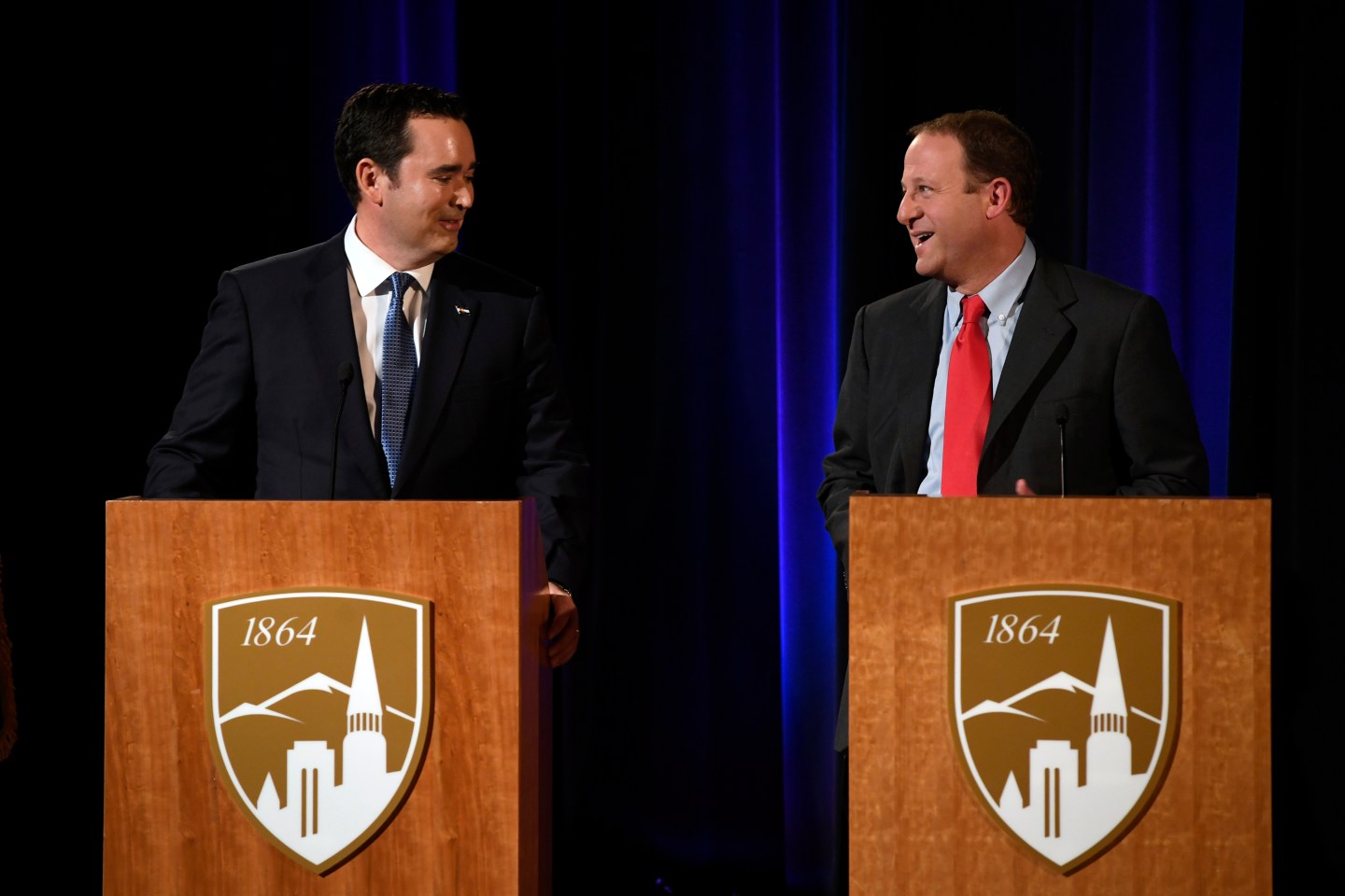 Colorado gubernatorial candidates Walker Stapleton (R), left, and Jared Polis (D) during their last debate before Election Day on Oct. 23, 2018 in Denver.