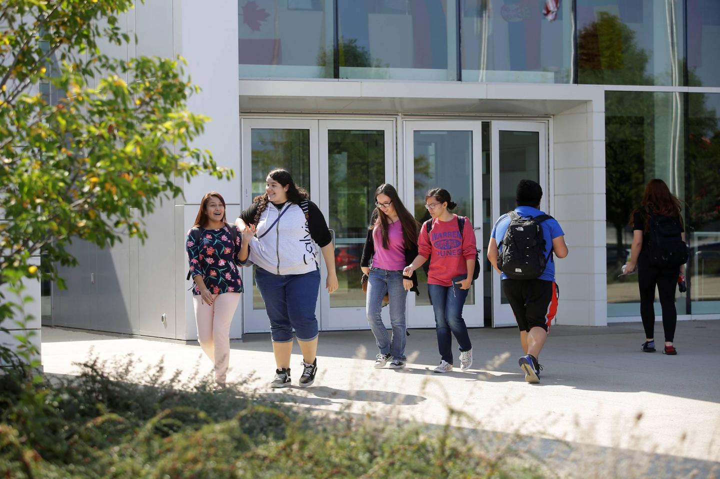 People walk along the campus of DeVry University in Chicago