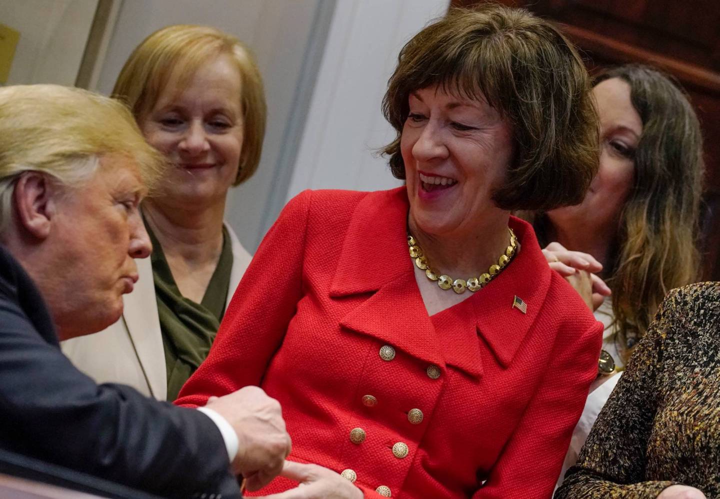 U.S. President Trump greets Senator Collins during signing ceremony for the "Know the Lowest Price Act" and the "Patients Right to Know Drug Prices Act" at the White House in Washington