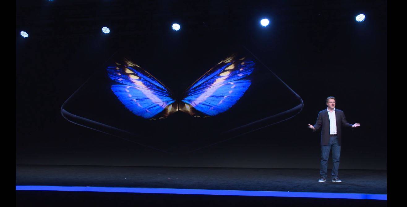 Samsung executive Justin Denison shows off foldable smartphone with 'Infinity Flex Display.'