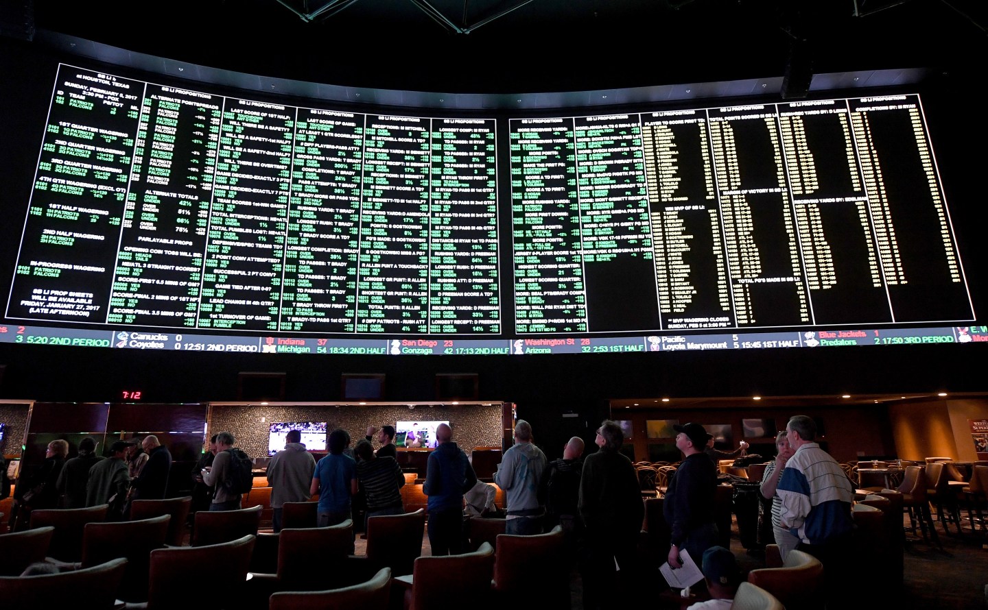Bettors line up to wager on Super Bowl LI between the Atlanta Falcons and the New England Patriots at the Westgate Las Vegas Resort & Casino on Jan. 26, 2017.