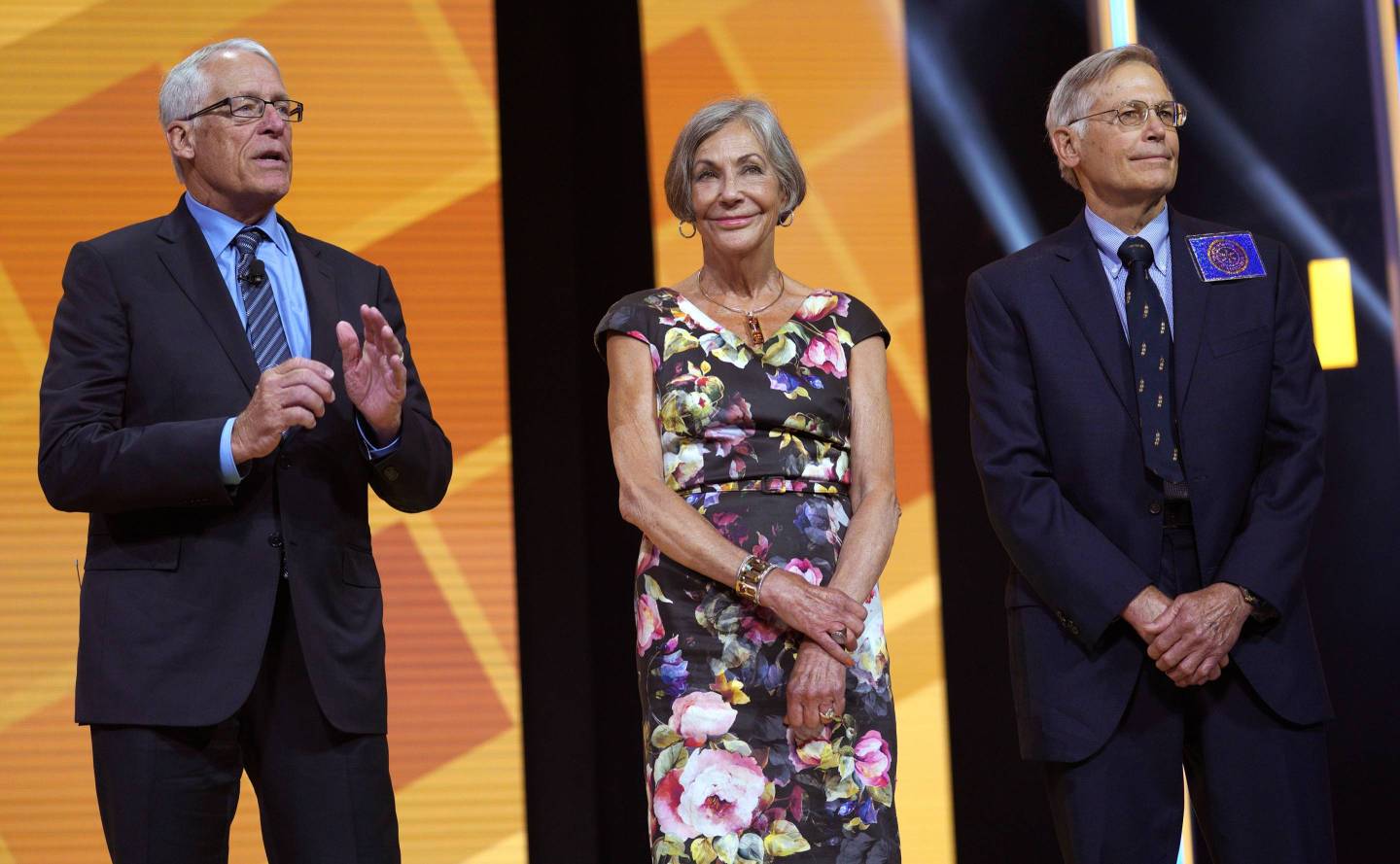 Members of the Walton family, Rob, Alice, and Jim (from left to right), speak during the annual Walmart shareholders meeting on June 1, 2018 in Fayetteville, Ark.