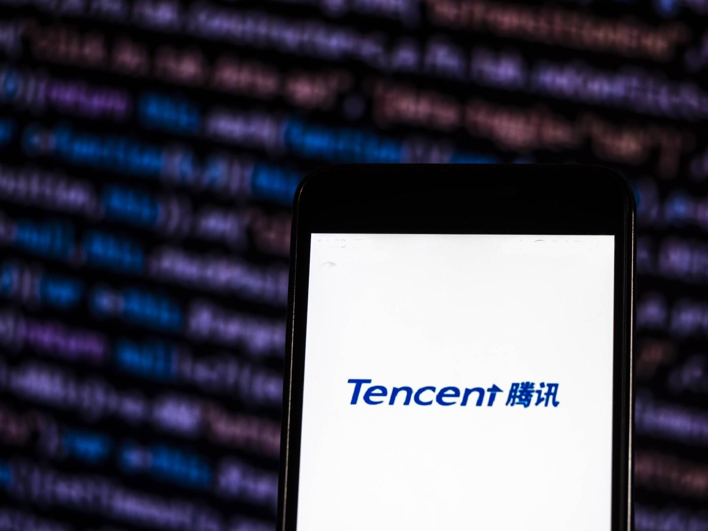 The Tencent logo seen displayed on a smart phone. According
