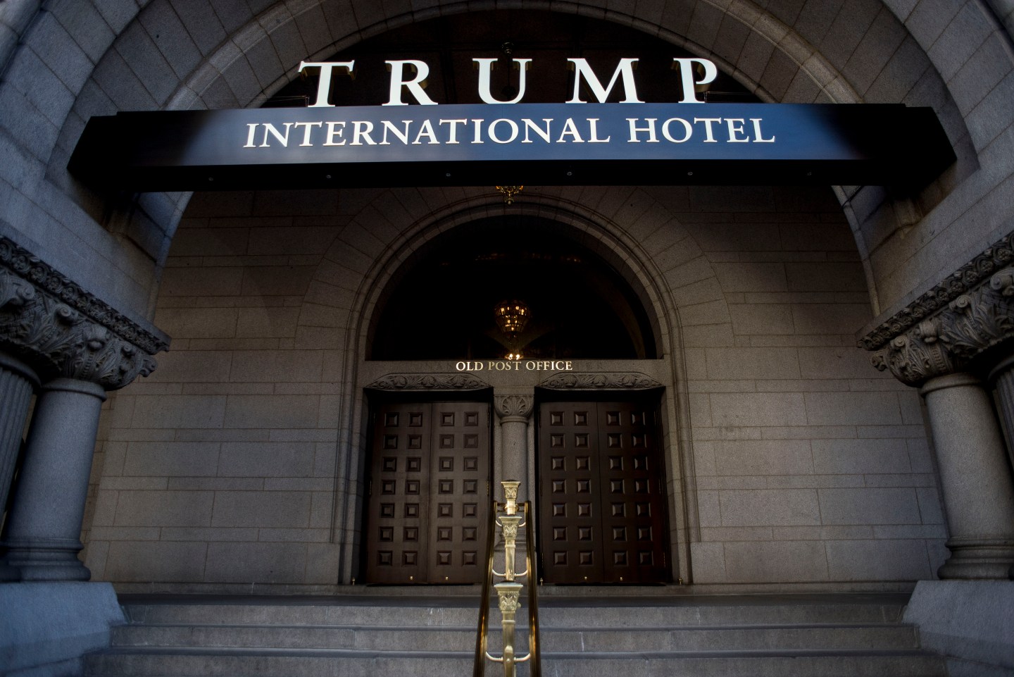 Anti-Trump Activists Protest Outside Of Trump International Hotel Opening Ceremony
