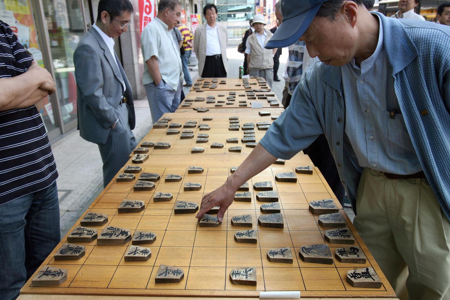 People play the "shogi" or Japanese ches