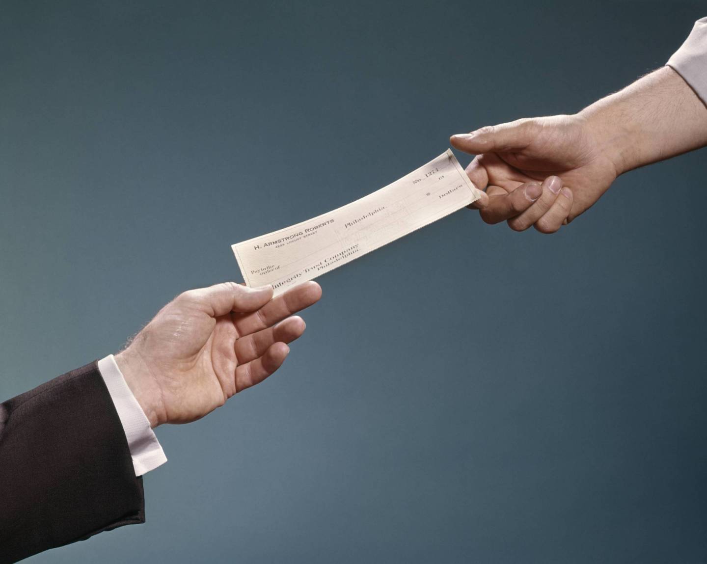 EMPLOYERS HAND HANDING...