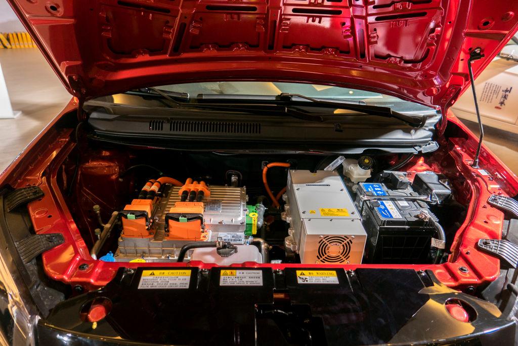 Batteries of an e-car are shown to the customers on the Expo