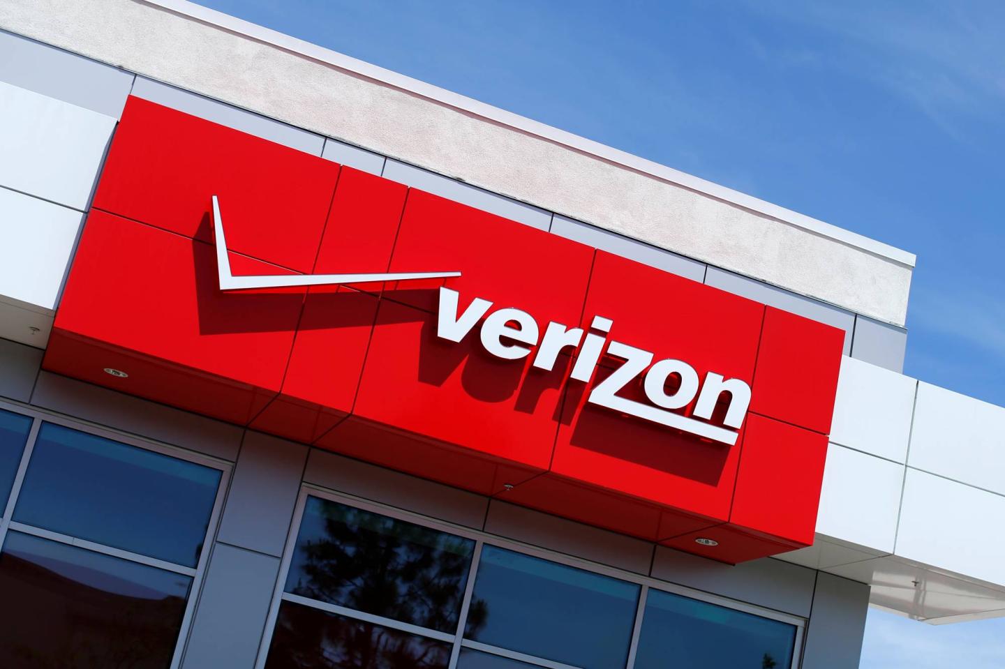 The Verizon logo is seen on one of their retail stores in San Diego, California