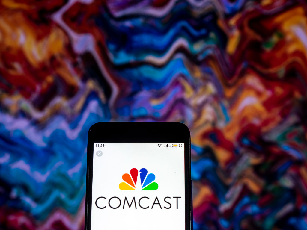 Comcast Telecommunications company logo seen displayed on
