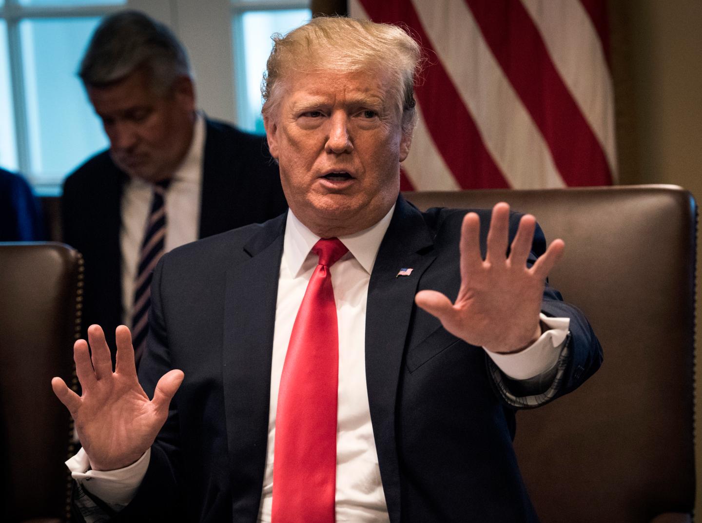 President Donald Trump leads a meeting of his Cabinet, in Washington, DC.