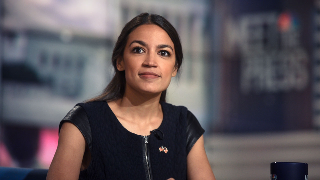 aoc in black dress The Squad review: AOC, the rise of the left and the fight against dark money | Books