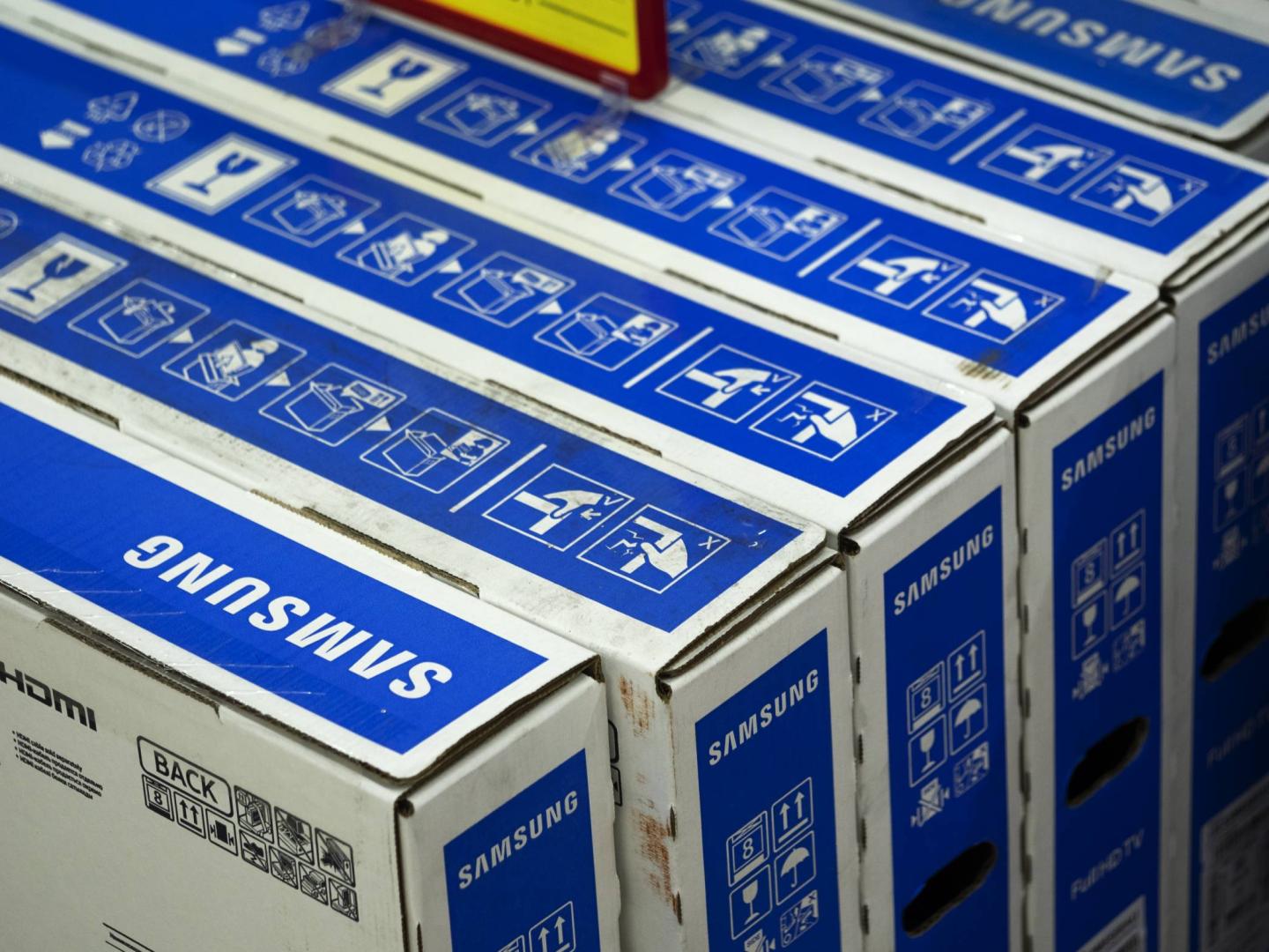 Boxes with Samsung television seen at the store