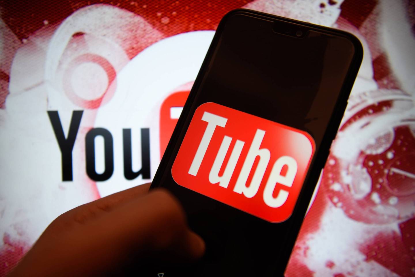Youtube logo is seen on an android mobile phone