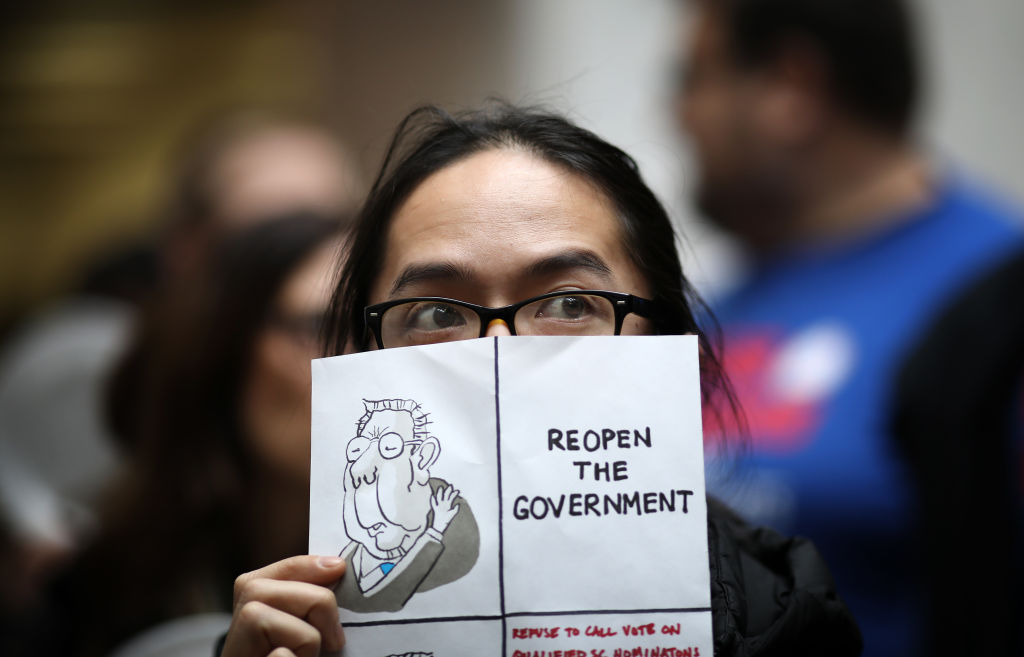 Federal Workers Stage Protest At U.S. Capitol