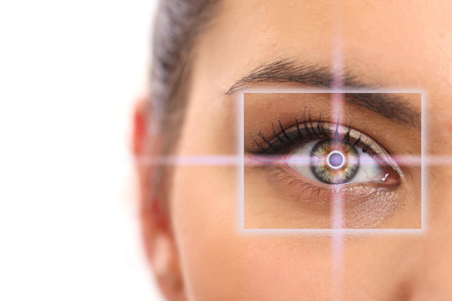 woman pointing to eye