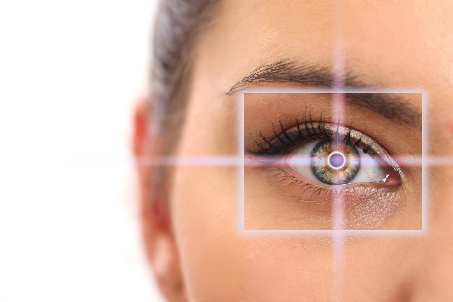 woman pointing to eye
