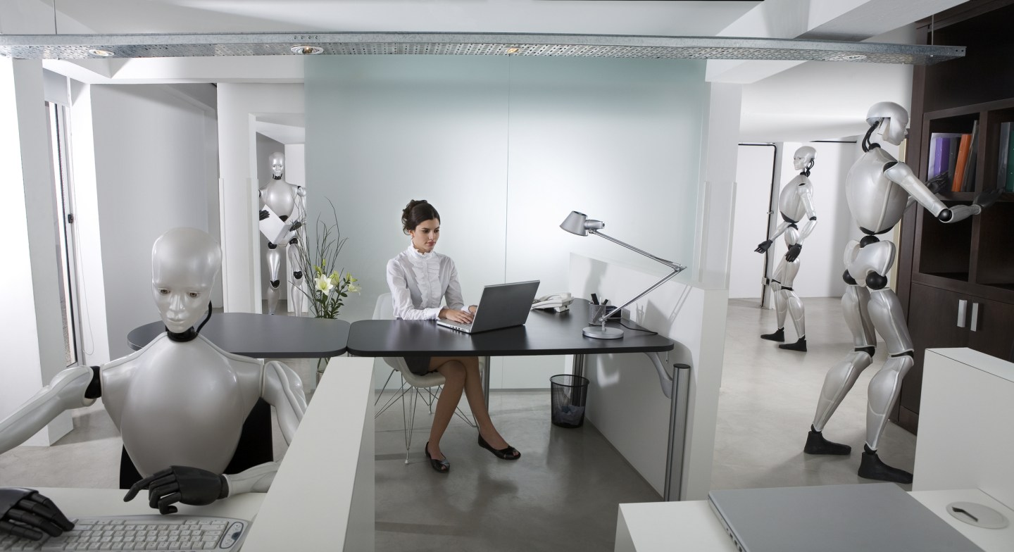 Businesswoman and Robots working at office
