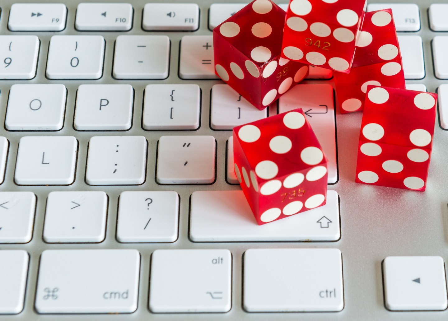 High Angle View Of Dices On Computer Keyboard