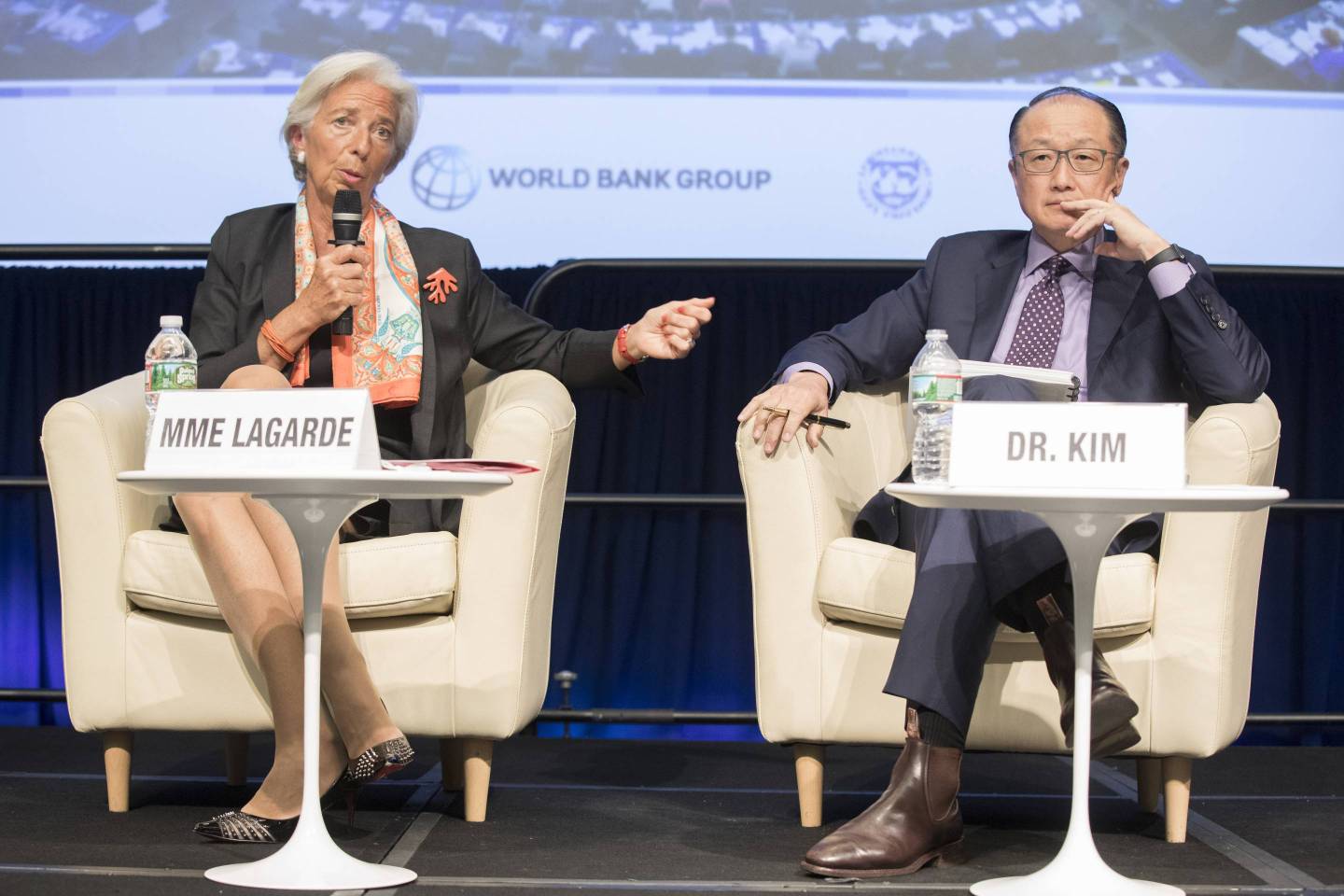 International Monetary Fund Managing Director Christine Lagarde (L) and World Bank President Jim Yong Kim (R) share a stage on Apr. 17, 2017 in Washington, D.C.