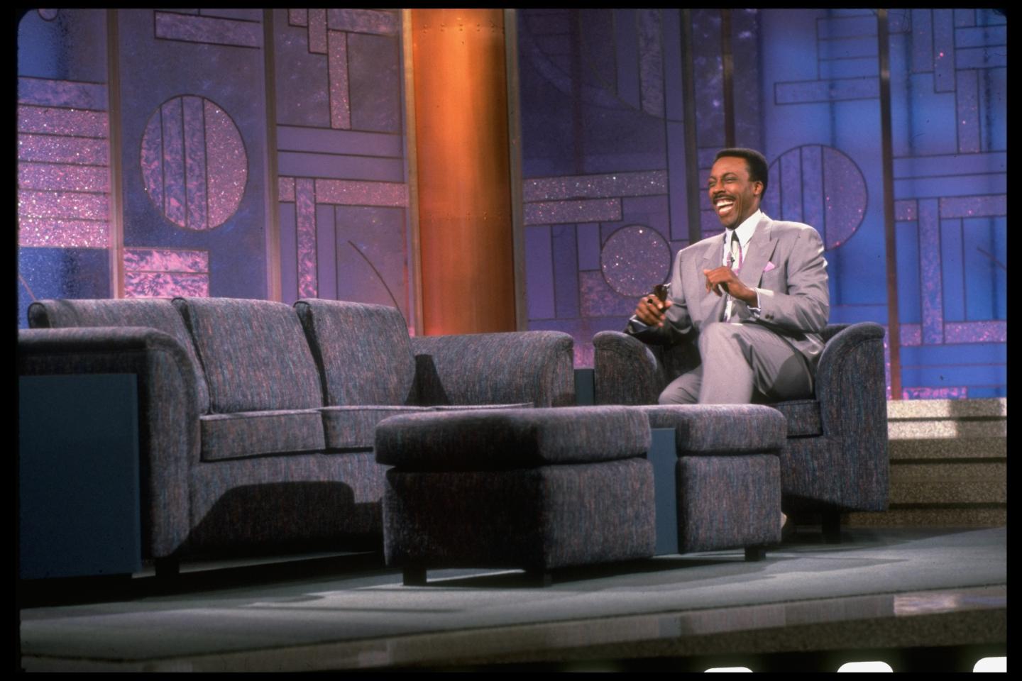 Talk show host Arsenio Hall hamming it up on set of The Arsenio Hall Show.