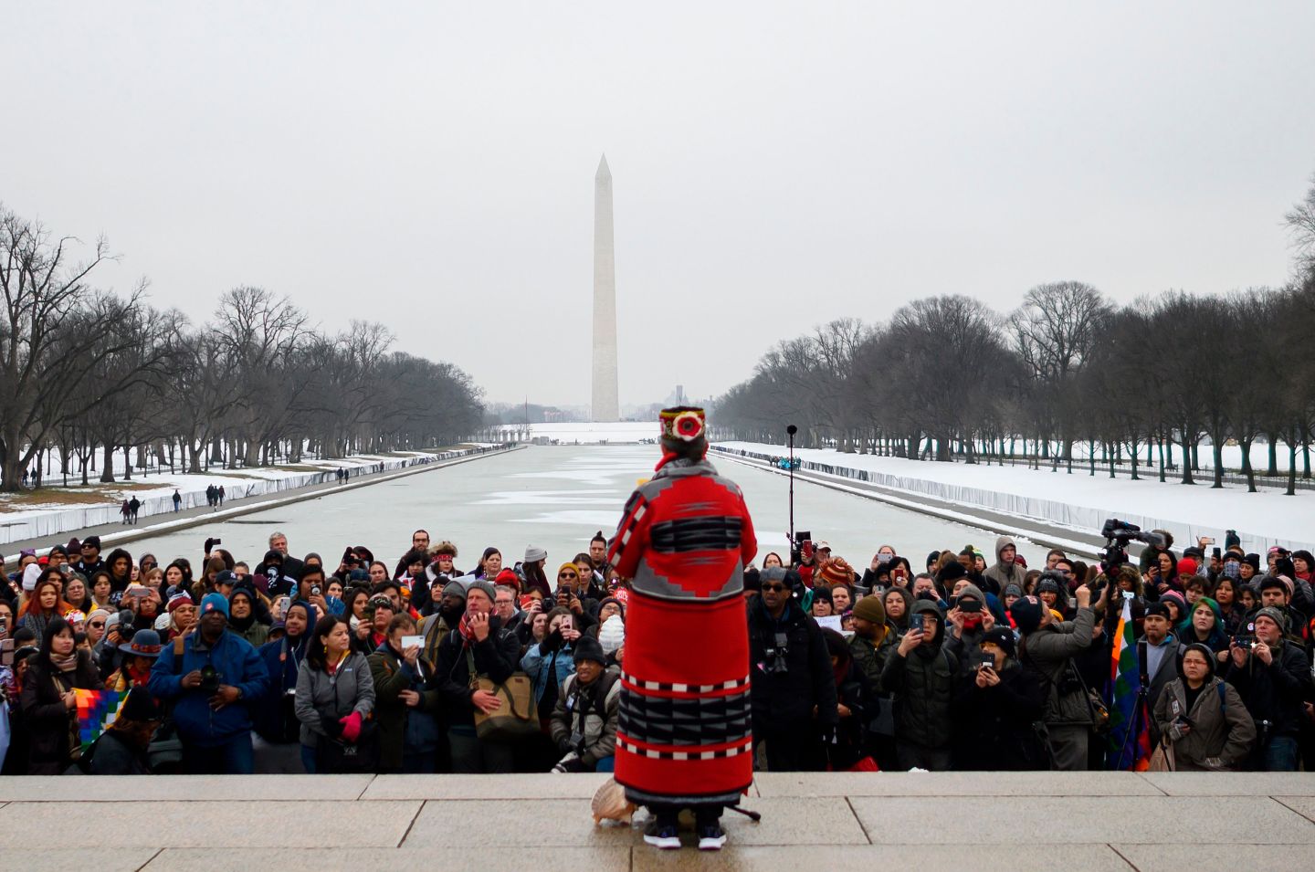 A woman speaks during the Indigenous People's March on the National Mall at the Lincoln Memorial in Washington, DC, on January 18, 2019.